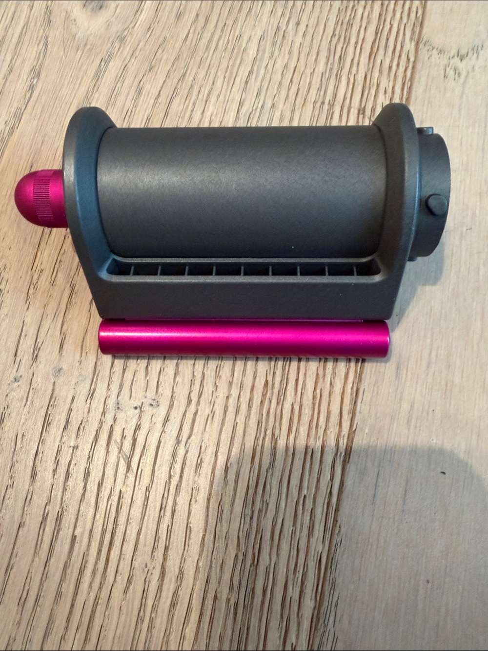 Gray Roller Tool with Metallic Pink Accents
